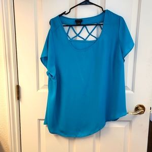 Blue open ladder back blouse